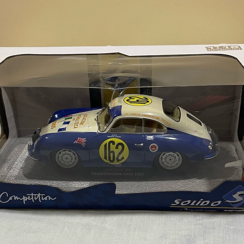 Solid Blue and White Toy Race Car collectible